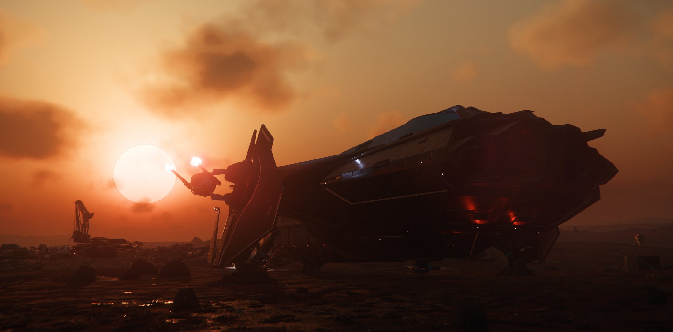 Anvil Carrack parked beneath an orange sunset