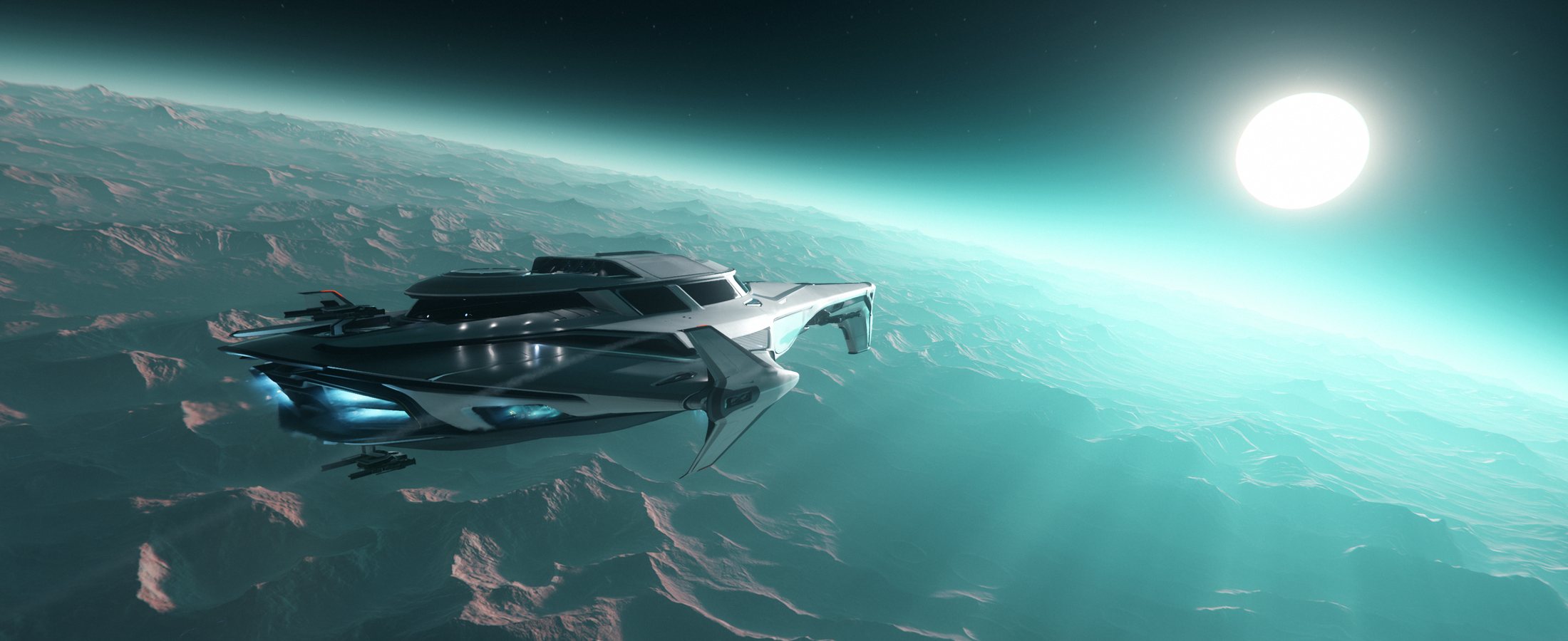 Origin 400i flying over a mountain range